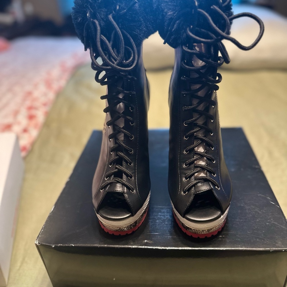Black Lace Up Boots with High-Top Design and Sturdy Sole